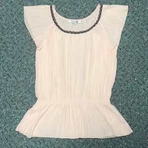 Pink blouse with black lace neck